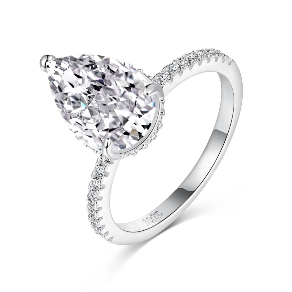 Classic Pear Cut Zirconia on solitaire band half pave Clear