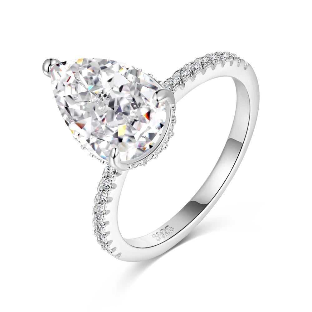 Classic Pear Cut Zirconia on solitaire band half pave Clear