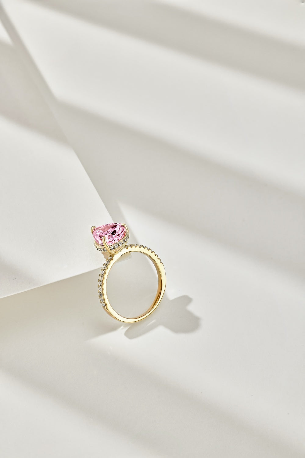 Classic Pear Cut Zirconia on solitaire band half pave gold baby pink
