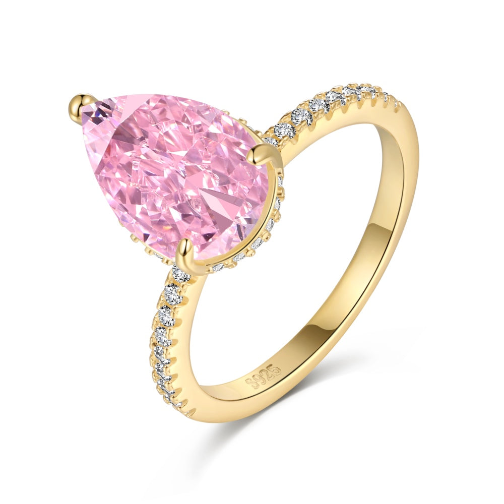 Classic Pear Cut Zirconia on solitaire band half pave gold baby pink
